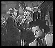 Dan tells Sheriff Lang Johnny's gone to Riddle