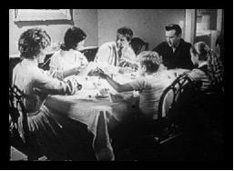 A complacent American family at dinner