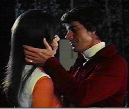 Peter Brown kissing Kathryn Loder