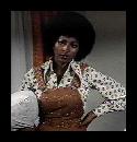 Pam Grier as Foxy Brown