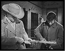 The two load the rifles