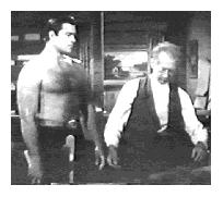 Clint Walker in one of his many bare chested poses