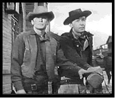 Bronson and his partner case the bank