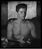 A little Peter Brown beefcake.  Jimmy wakes to Colts knock on the hotel door