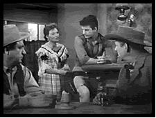 Julie returns to the saloon