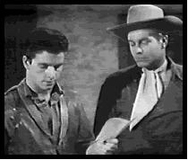 Jimmy grabs the telegram before whacking Colt on the head