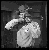 Pointing the rifle as in the Lawman opening