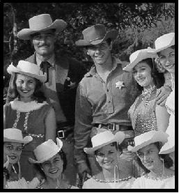 closeup of John Russell and Peter Brown with Kilgour Rangerettes