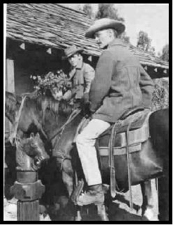 Peter Brown and John Russell on horseback in the heavy jackets they wore for Wyoming weather