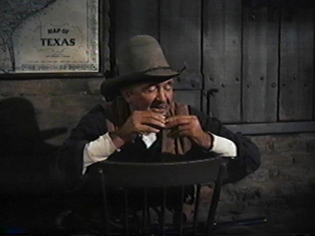 Walter Brennan plays mouth organ