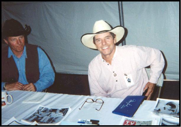 ... [wearing his George Strait ...