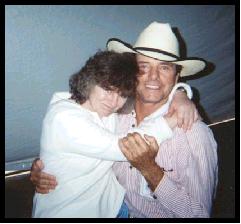 ... [wearing his George Strait ...