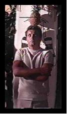 Eskimo [Jim Mitchum] goads Jody into shooting a pineapple above his head