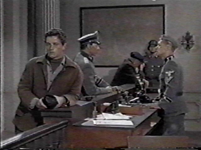 He hides in plain sight in a police station