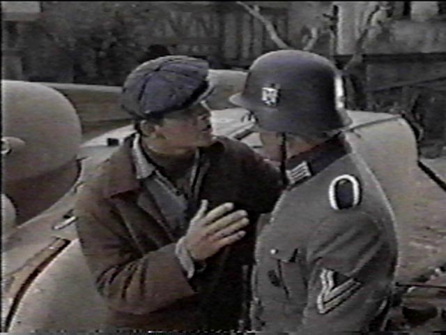 Hauser tells a German he's running from a girl's husband