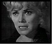 LAURIE MITCHELL as Annie Tolleson